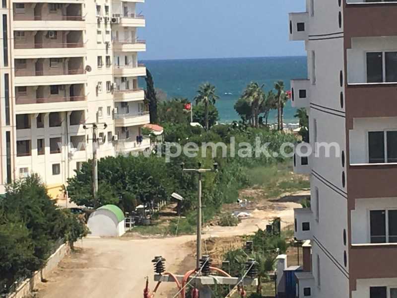 ERDEMLİ ARPAÇBAHŞİŞ BELDEKUM SİTESİNDE SATILIK YAZLIK DAİRE