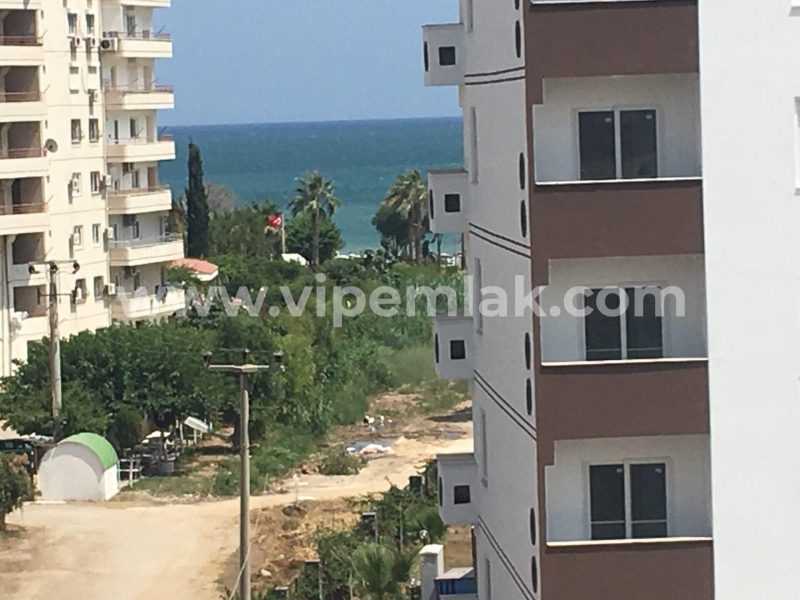 ERDEMLİ ARPAÇBAHŞİŞ BELDEKUM SİTESİNDE SATILIK YAZLIK DAİRE