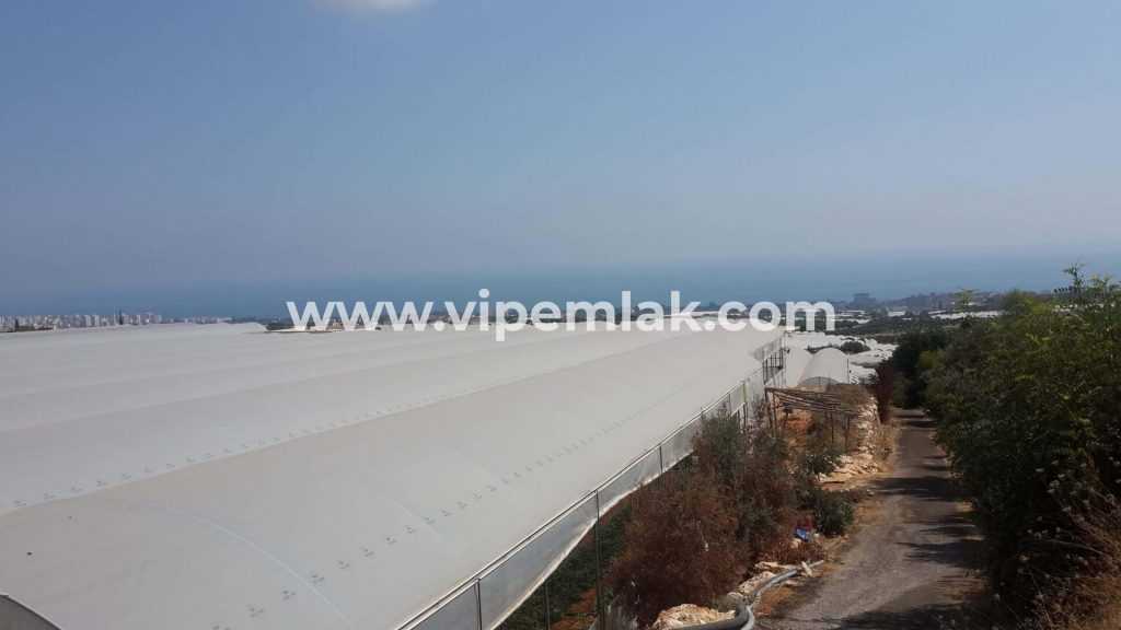 ERDEMLİ SİTE OLMAYA MUSAİT DENİZ MANZARALI SATILIKVİLLALIK ARSA