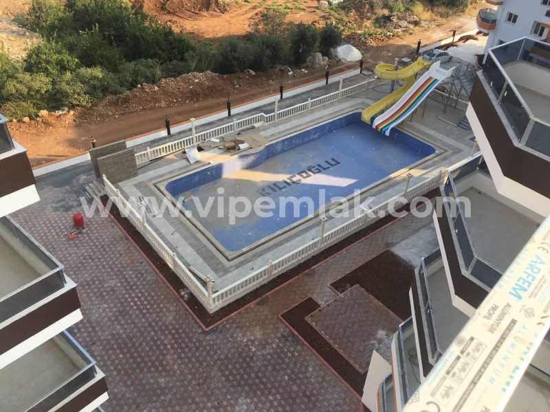 MERSİNİN GÖZDESİ KIZKALESİNDE HAVUZLU SİTEDE 2+1 SATILIK DAİRE