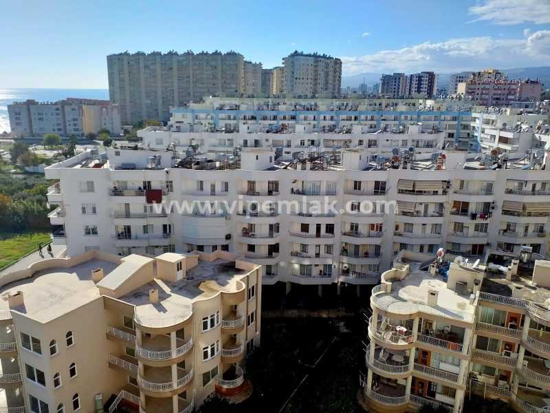 TÖMÜK TROPİK SİTESİ YÜKSEK KAT DENİZ MANZARALI SATILIK 2+1 DAİRE
