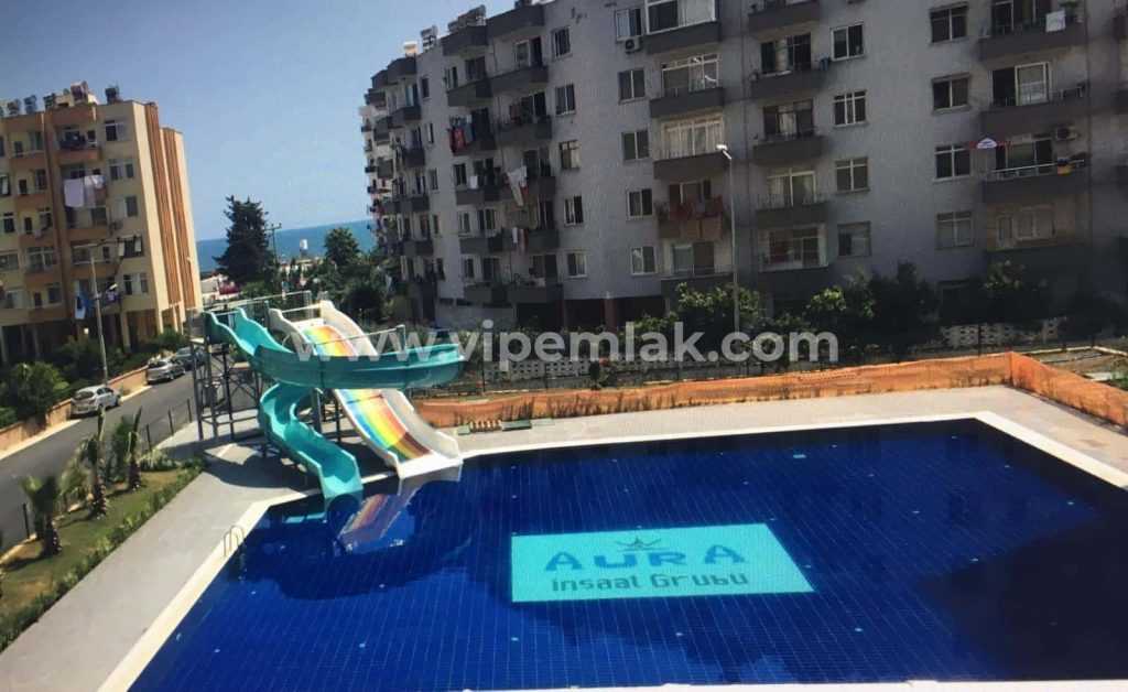 MERSİN TÖMÜK AURO RESORT DENİZE YAKIN SATILIK YAZLIK 1+1 DAİRE