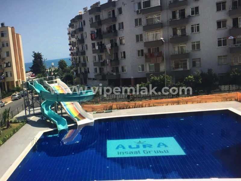 MERSİN TÖMÜK AURO RESORT DENİZE YAKIN SATILIK YAZLIK 1+1 DAİRE