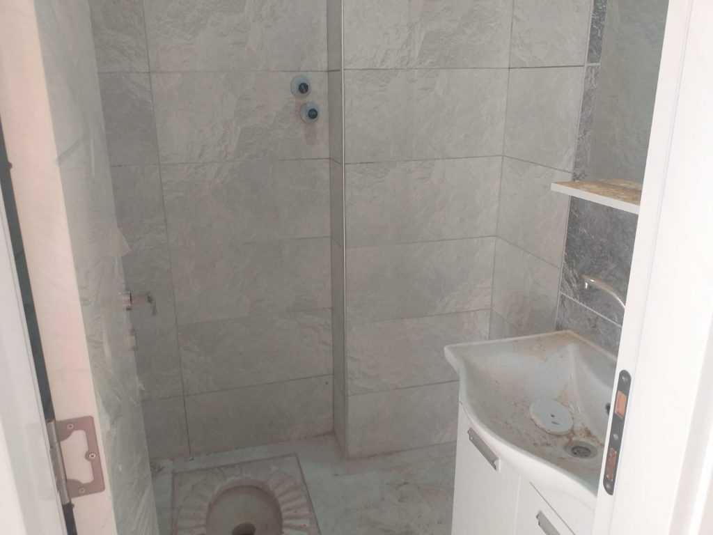 ERDEMLİ HASTANE CADDESİNDE SIFIR 2+1 EŞYASIZ SATILIK DAİRE