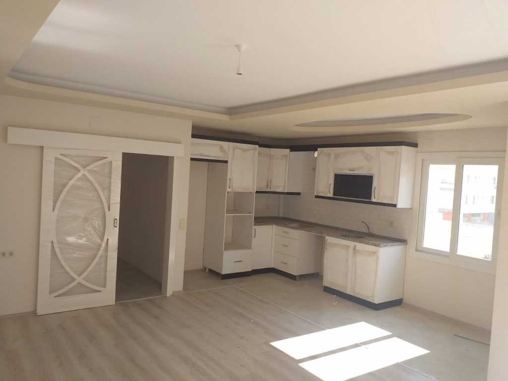 ERDEMLİ HASTANE CADDESİNDE SIFIR 2+1 EŞYASIZ SATILIK DAİRE
