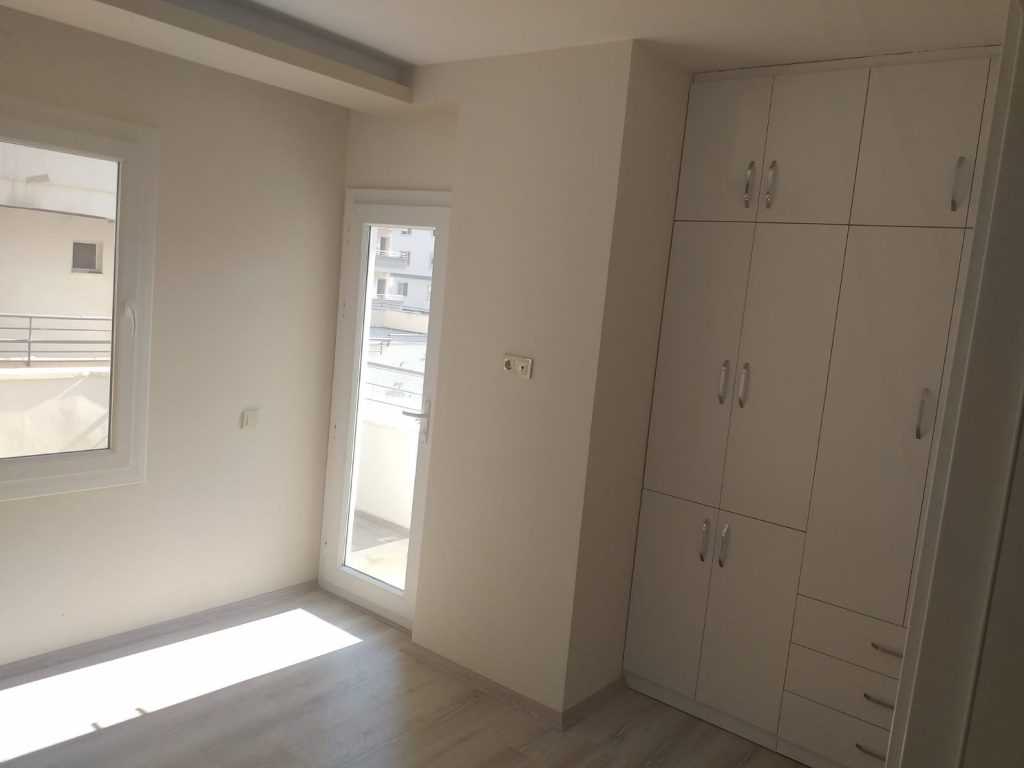 ERDEMLİ HASTANE CADDESİNDE SIFIR 2+1 EŞYASIZ SATILIK DAİRE