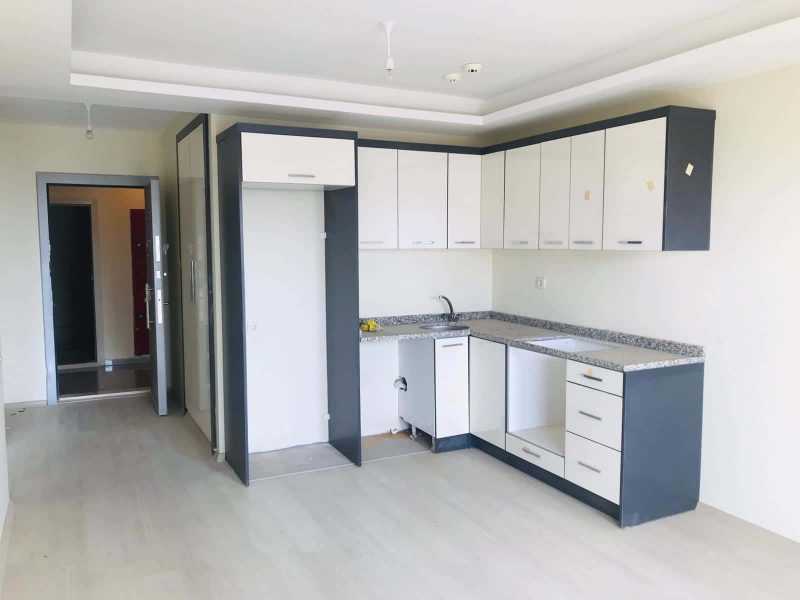 TÖMÜK’TE KELEPİR FİYATTA YÜKSEK KATTA SATILIK YAZLIK DAİRE