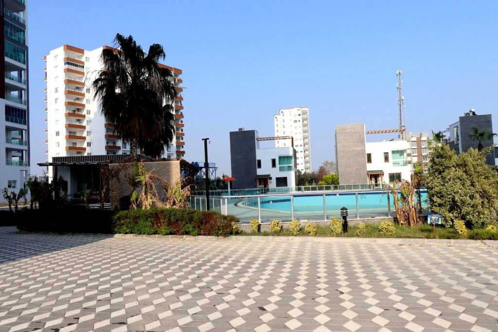 ERDEMLİ TÖMÜK ASİS MARMARİS 1+1 EŞYALI SATILIK DAİRE