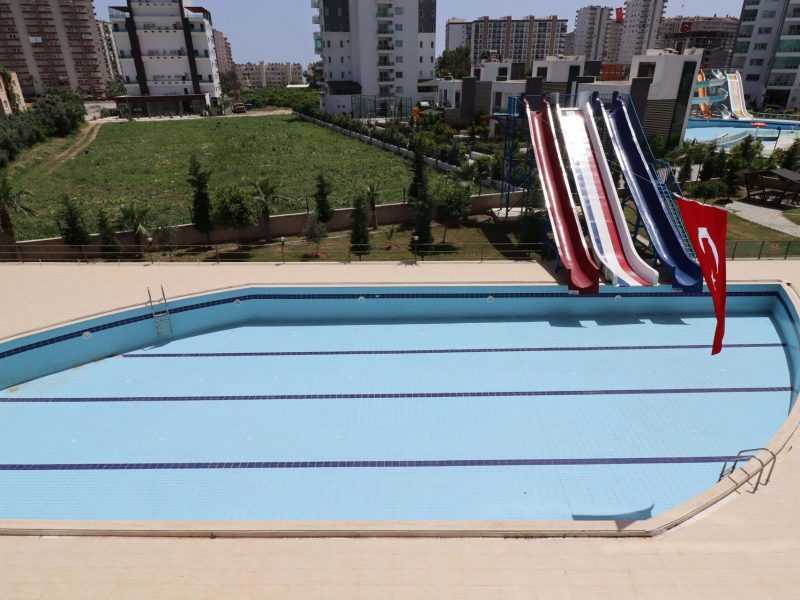 ERDEMLİ TÖMÜK CLASS SİTESİNDE EŞYALI KELEPİR SATILIK 1+1 DAİRE