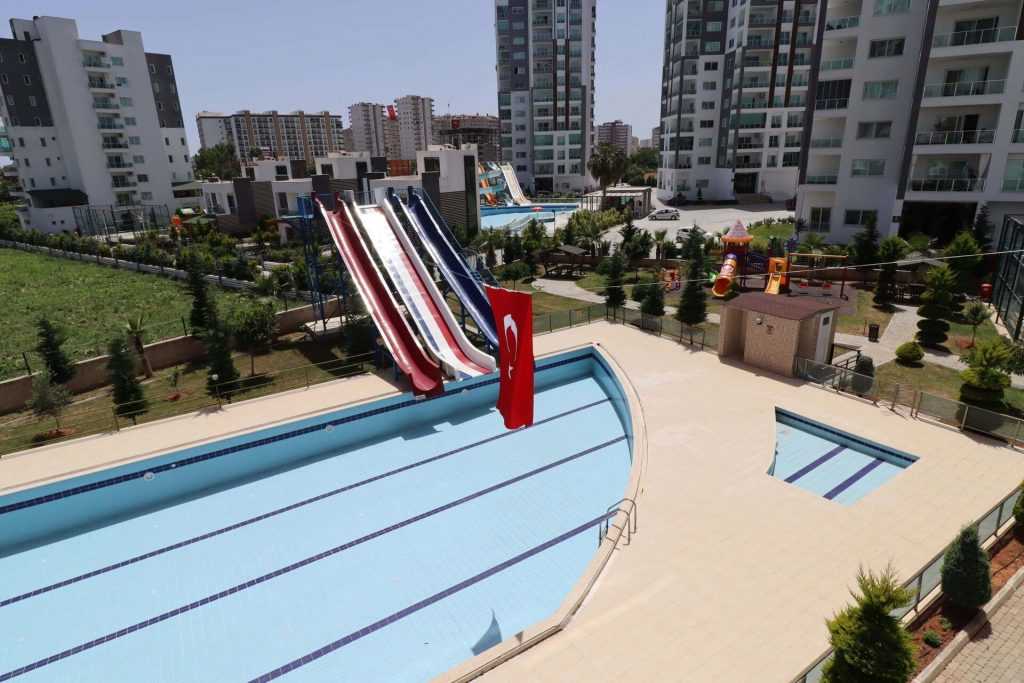ERDEMLİ TÖMÜK CLASS SİTESİNDE EŞYALI KELEPİR SATILIK 1+1 DAİRE