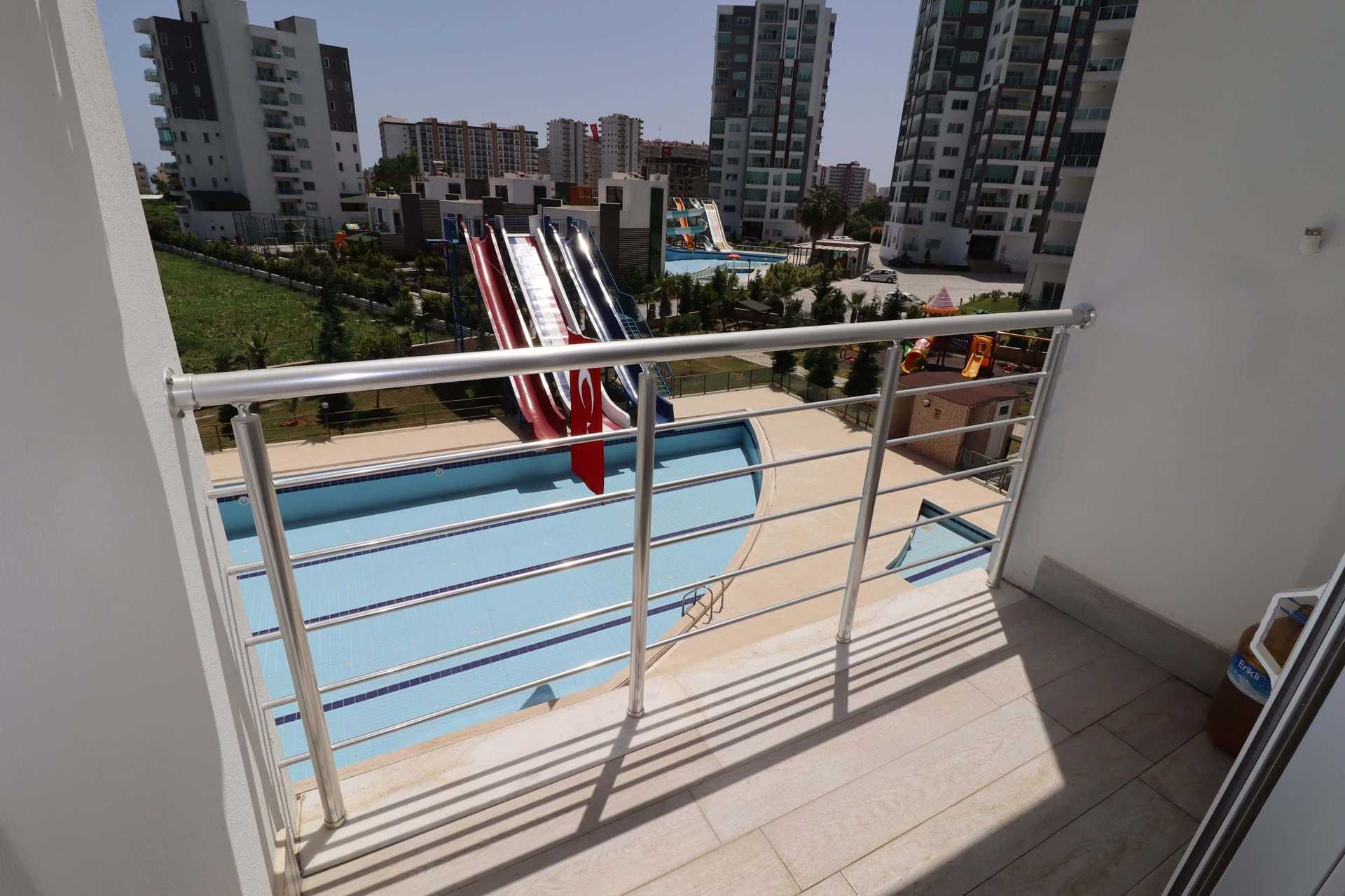 ERDEMLİ TÖMÜK CLASS SİTESİNDE EŞYALI KELEPİR SATILIK 1+1 DAİRE