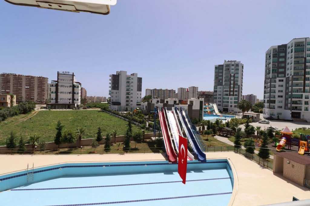 ERDEMLİ TÖMÜK CLASS SİTESİNDE EŞYALI KELEPİR SATILIK 1+1 DAİRE