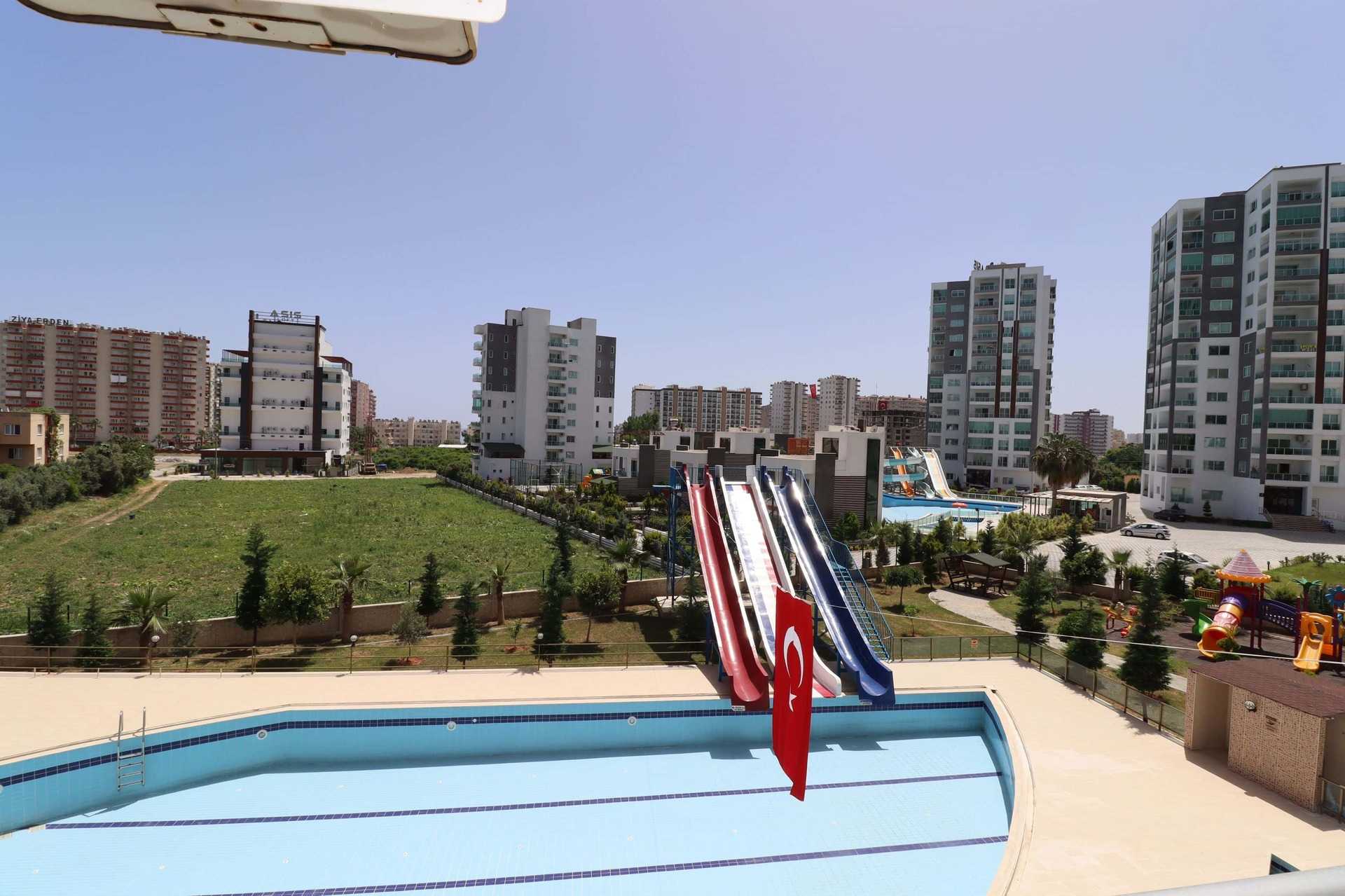 ERDEMLİ TÖMÜK CLASS SİTESİNDE EŞYALI KELEPİR SATILIK 1+1 DAİRE