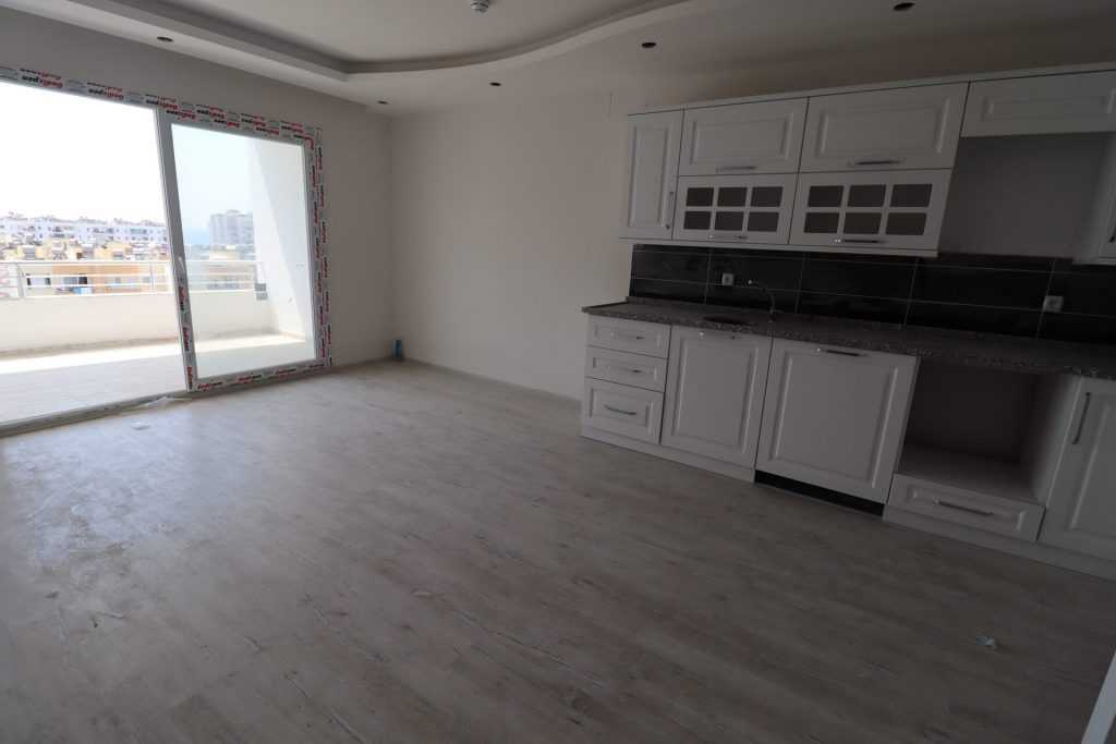 ERDEMLİ ARPAÇBAHŞİŞ DENİZ MANZARALI KUZEY GÜNEY CEPHELİ SATILIK 1+1 SIFIR DAİRE