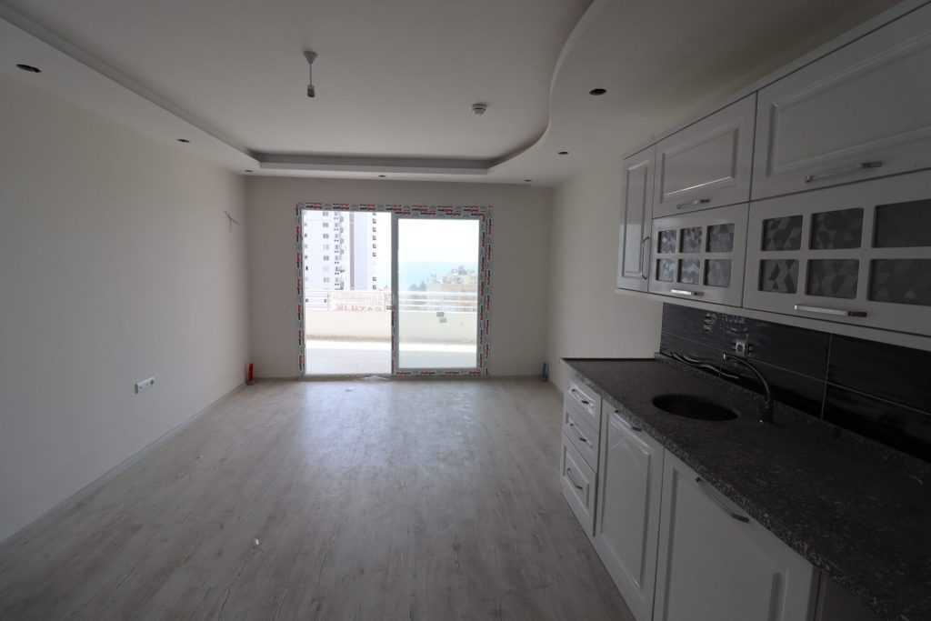 ERDEMLİ ARPAÇBAHŞİŞ DENİZ MANZARALI KUZEY GÜNEY CEPHELİ SATILIK 1+1 SIFIR DAİRE