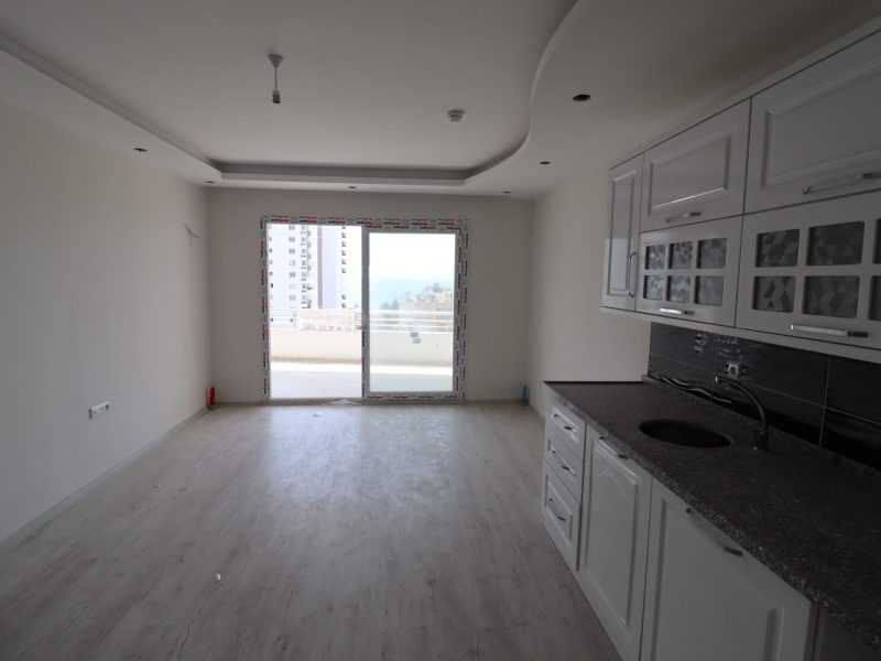 ERDEMLİ ARPAÇBAHŞİŞ DENİZ MANZARALI KUZEY GÜNEY CEPHELİ SATILIK 1+1 SIFIR DAİRE