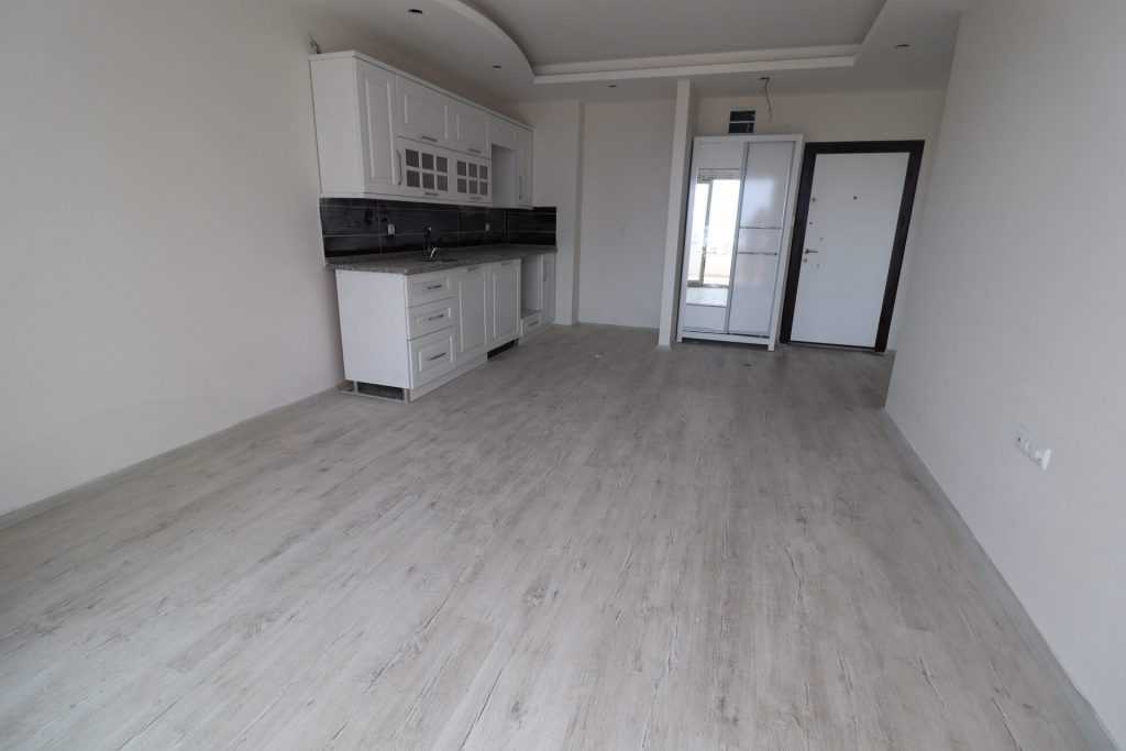 ERDEMLİ ARPAÇBAHŞİŞ DENİZ MANZARALI KUZEY GÜNEY CEPHELİ SATILIK 1+1 SIFIR DAİRE