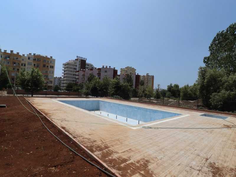 ERDEMLİ ARPAÇBAHŞİŞ DENİZ MANZARALI KUZEY GÜNEY CEPHELİ SATILIK 1+1 SIFIR DAİRE