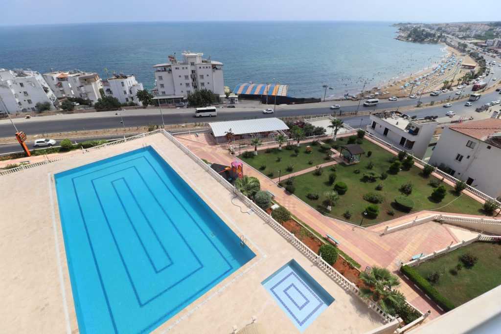 AYAŞ KOÇ SİTESİ EŞYALI SATILIK DENİZ MANZARALI 2+1 DAİRE