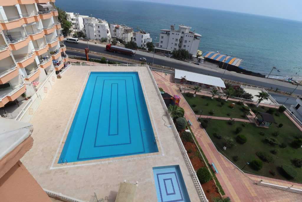 AYAŞ KOÇ SİTESİ EŞYALI SATILIK DENİZ MANZARALI 2+1 DAİRE