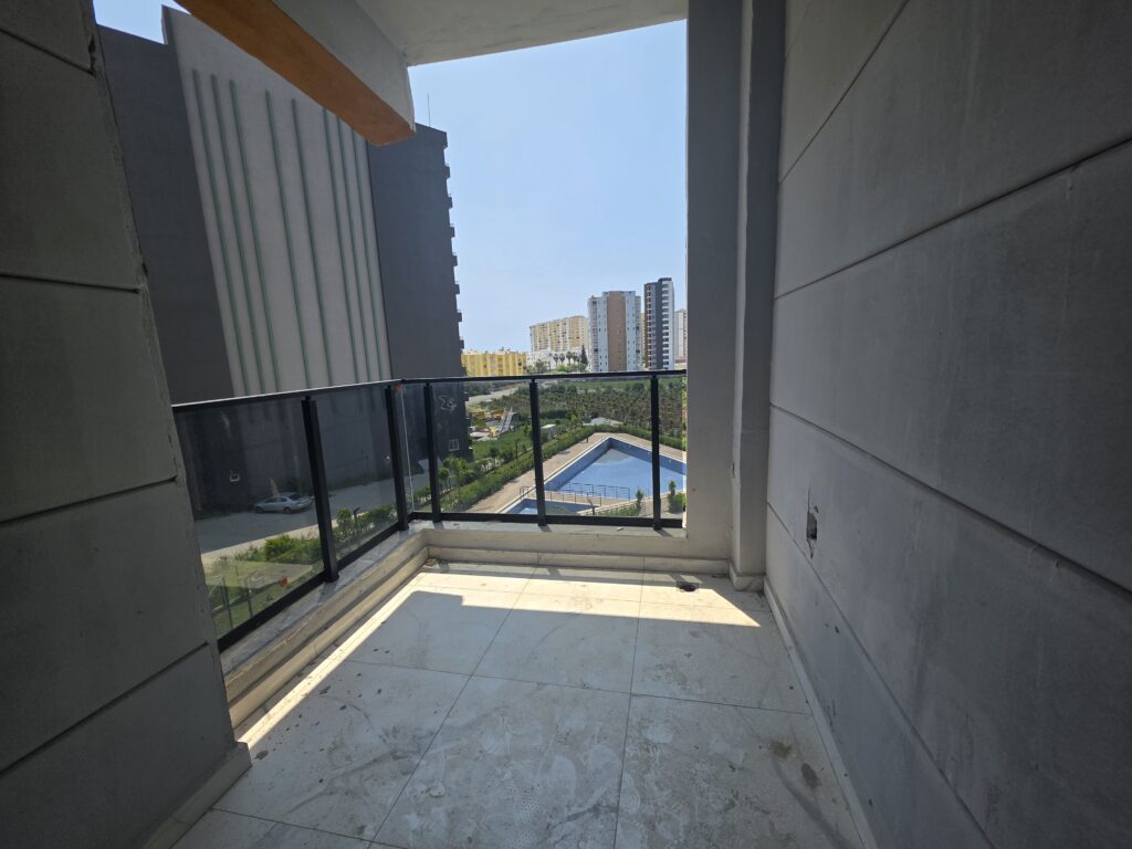 Mersin Erdemli Çeşmeli Emerald Deluxe Satılık 2+1  Aquapark Havuzlu Daire