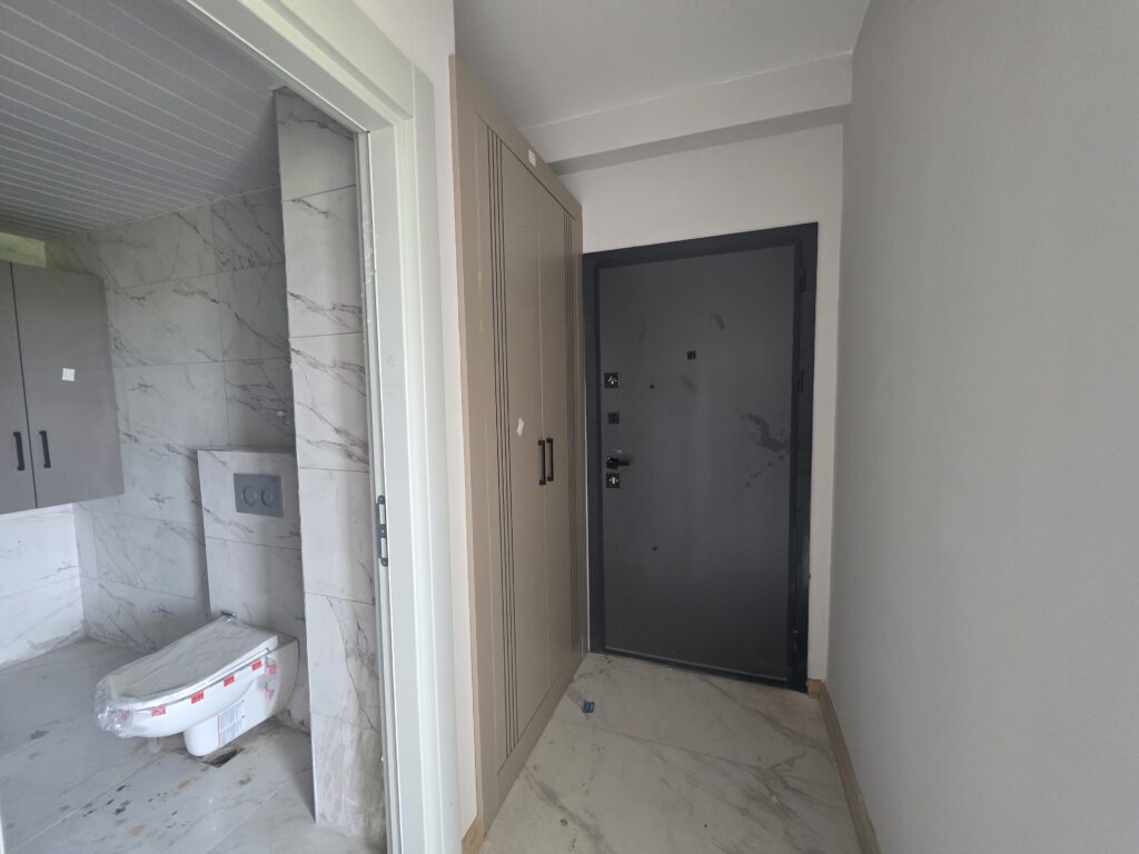 Квартира 1+1 на продажу в жилом комплексе Erdemli Çeşmeli Emerald Deluxe, Мерсин